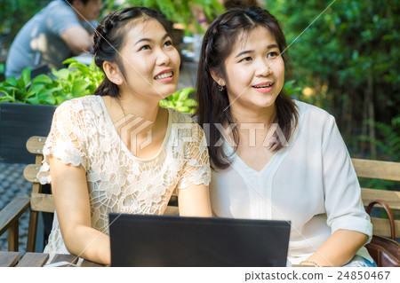 Asian businees women enjoying with her friend 24850467