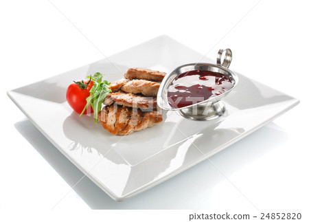 Grilled serving steak with tomato, fresh herbs and Grilled serving steak with tomato, fresh herbs and 24852820