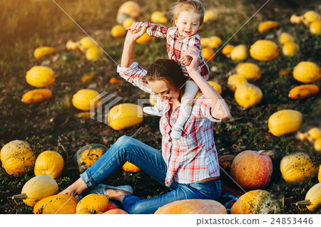 mother playing with her daughter 24853446