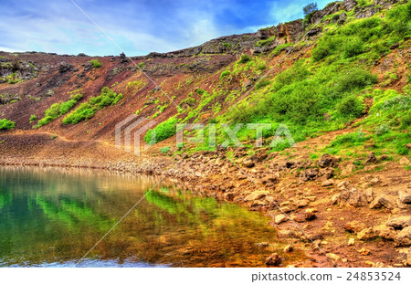 Kerid, a volcanic crater lake in Iceland Kerid, a volcanic crater lake in Iceland 24853524