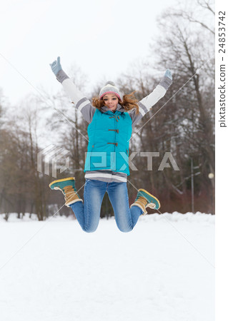 Winter woman have fun outdoors 24853742