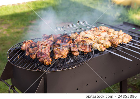 Grilled pork kebab on skewers 24853880