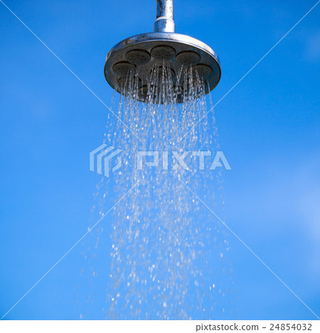 Water pouring from shower 24854032