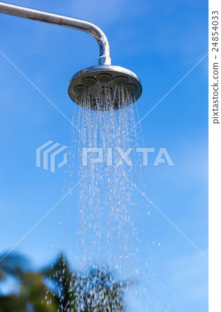 Water pouring from shower 24854033