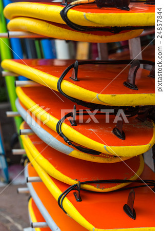 Surf boards in a stack Surf boards in a stack 24857844