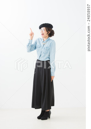 Full body photo of a woman in her 20s with a happy expression Full body photo of a woman in her 20s with a happy expression 24858937