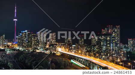 Glowing light streaks along Gardiner Expressway. 24861453