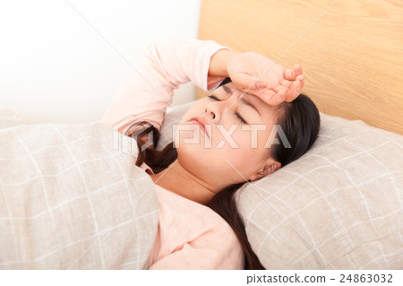 A woman in bed 24863032