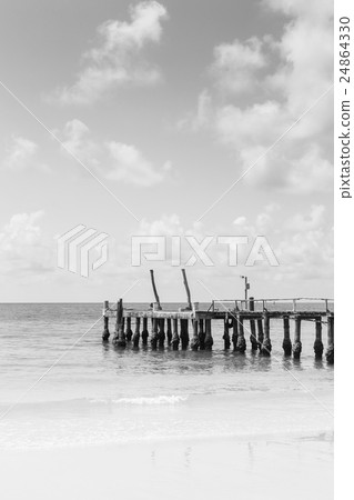 Fishing jetty over seacoast skyline 24864330