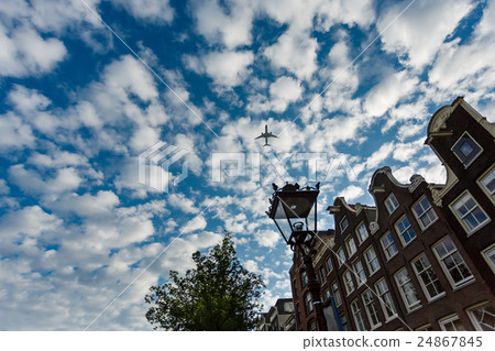Airplane over Amsterdam Airplane over Amsterdam 24867845