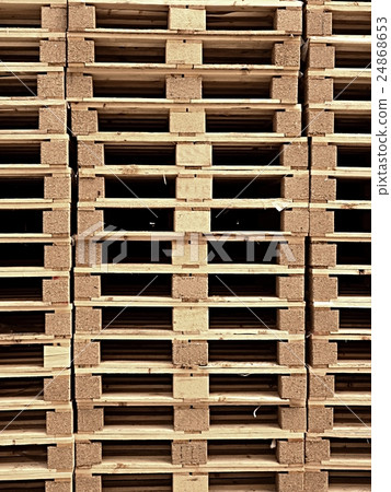 Pallets in a yard ready for breaking up and use 24868653