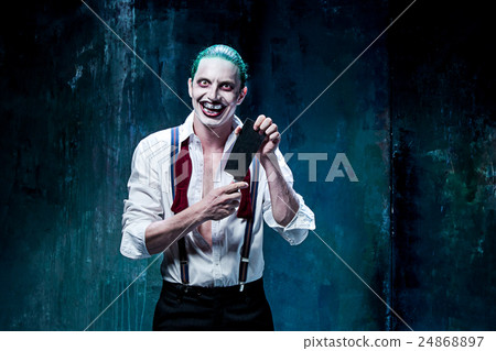 Bloody Halloween theme: crazy joker face 24868897