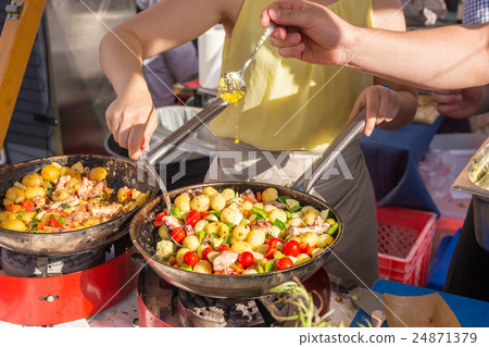 Cheff cooking traditional Mediterranean octopus on Cheff cooking traditional Mediterranean octopus on 24871379