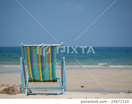 Beach chair on the sand 24871520