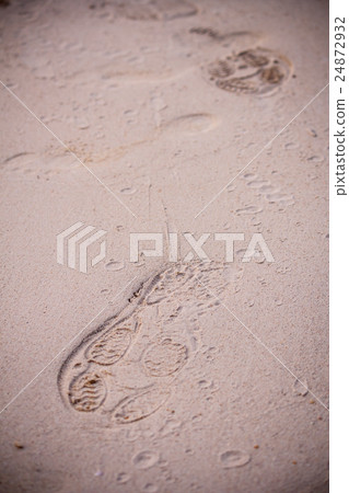 Shot of footprints on white sand Shot of footprints on white sand 24872932