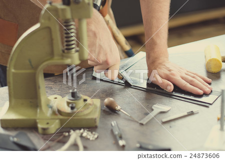 Leather workshop owner 24873606