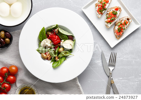 Italian salad and traditional bruschetta Italian salad and traditional bruschetta 24873927