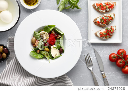 Italian basil salad and traditional bruschetta Italian basil salad and traditional bruschetta 24873928