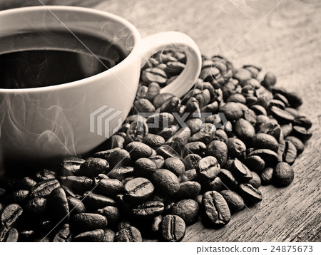 black and white coffee on grunge wooden background black and white coffee on grunge wooden background 24875673