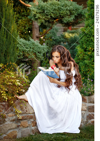 Girl with enthusiasm reads book Girl with enthusiasm reads book 24879296