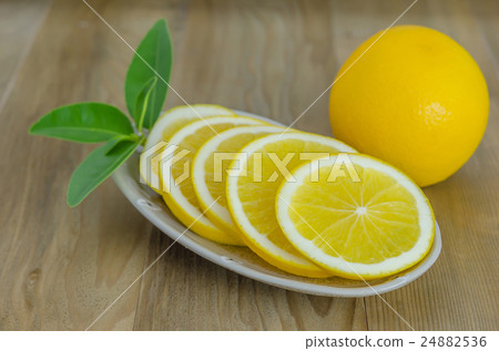 slice orange on dish slice orange on dish 24882536