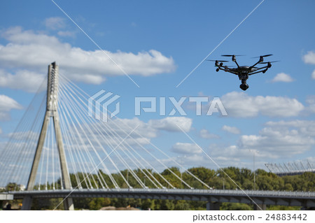 Copter flight against blue sky. RC aerial drone. Copter flight against blue sky. RC aerial drone. 24883442