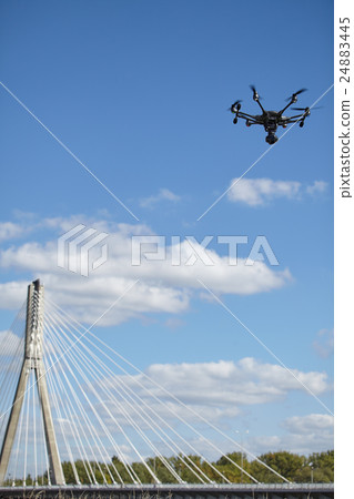 Copter flight against blue sky. RC aerial drone. Copter flight against blue sky. RC aerial drone. 24883445