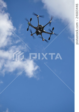 Copter flight against blue sky. RC aerial drone. Copter flight against blue sky. RC aerial drone. 24883446
