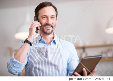 Handsome man using smart phone 24891941