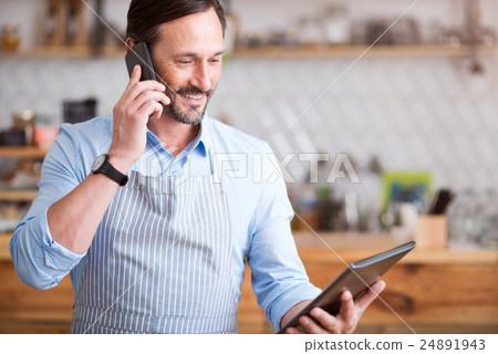 Nice man using smart phone Nice man using smart phone 24891943