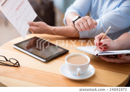 Two colleagues working together 24891973
