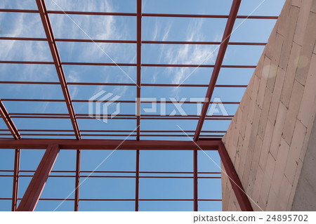 Structural steel beam on roof of building Structural steel beam on roof of building 24895702