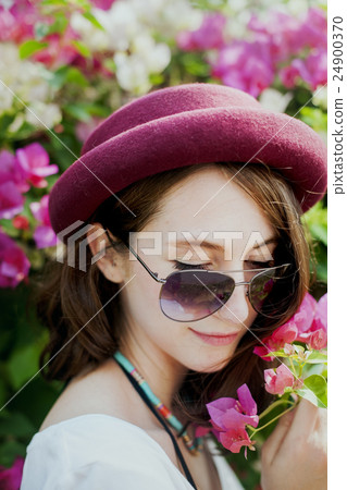 Female Outdoors Flower Photography Concept Female Outdoors Flower Photography Concept 24900370