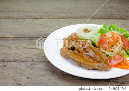 Grilled steak meat with vegetable salad on wood Grilled steak meat with vegetable salad on wood 24903404
