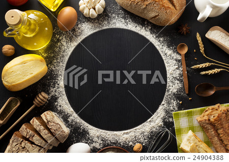 bread and bakery  ingredients on wood 24904388