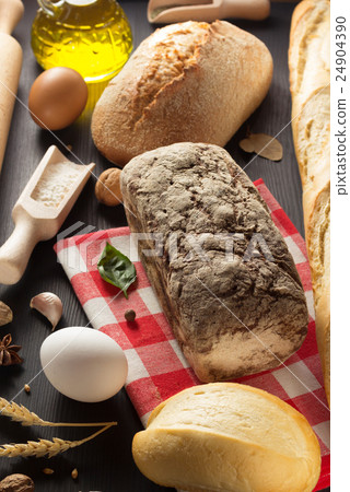 bread and bakery  ingredients on wood 24904390
