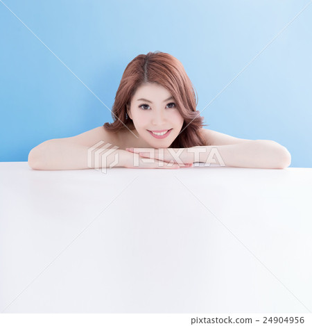 woman lying on white table woman lying on white table 24904956