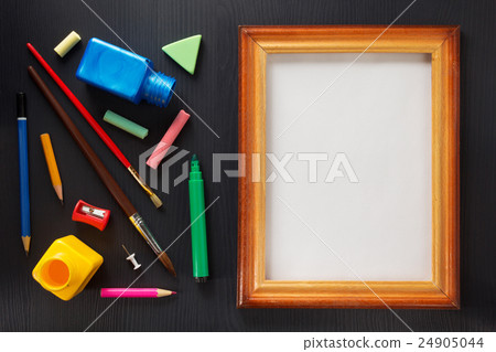 paint supplies and frame on black wood paint supplies and frame on black wood 24905044