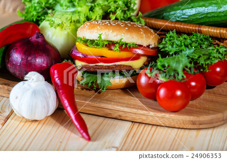 homemade hamburger with fresh vegetables, close up homemade hamburger with fresh vegetables, close up 24906353