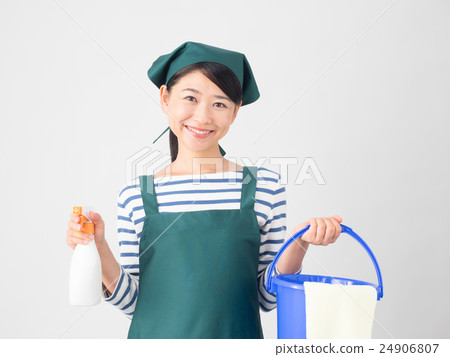 A young woman with detergent and bucket 24906807