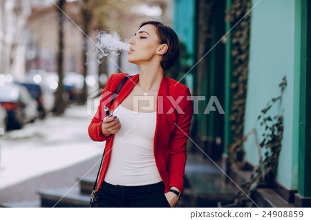 girl with the electronic cigarette girl with the electronic cigarette 24908859