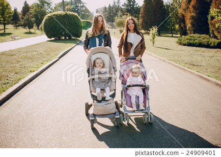 Family walk in the park 24909401