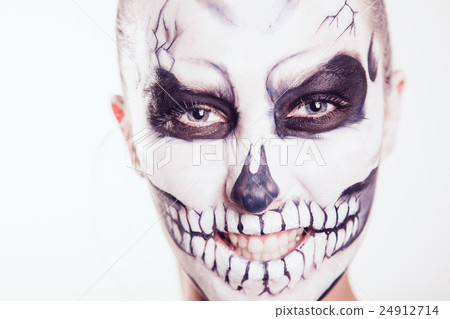 Girl with Halloween face art on white background Girl with Halloween face art on white background 24912714