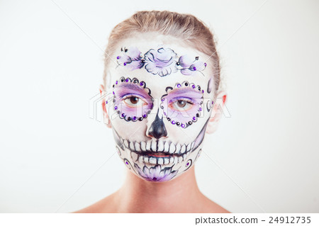 Girl with Halloween face art on white background Girl with Halloween face art on white background 24912735