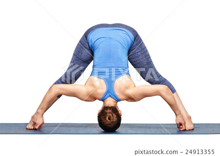Woman practices Ashtanga Vinyasa yoga asana 24913355