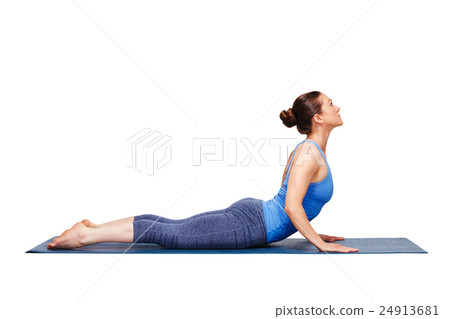 Sporty fit yogini woman practices yoga asana 24913681