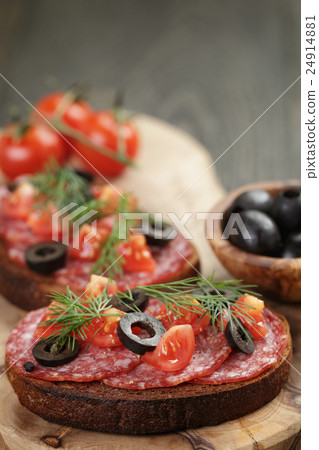 open rye sandwich with salami and vegetables open rye sandwich with salami and vegetables 24914881