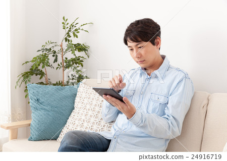 Men enjoy tablets 24916719