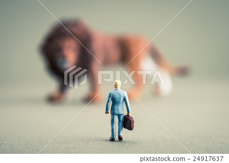 Lion and miniature human Lion and miniature human 24917637