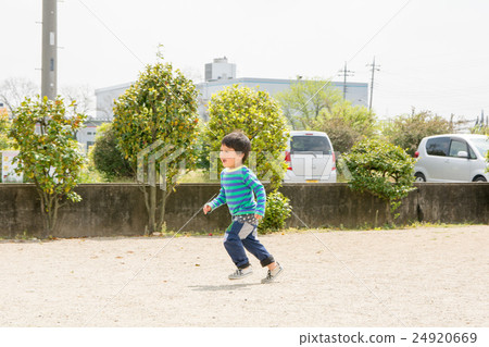 A boy who runs with a smile 24920669